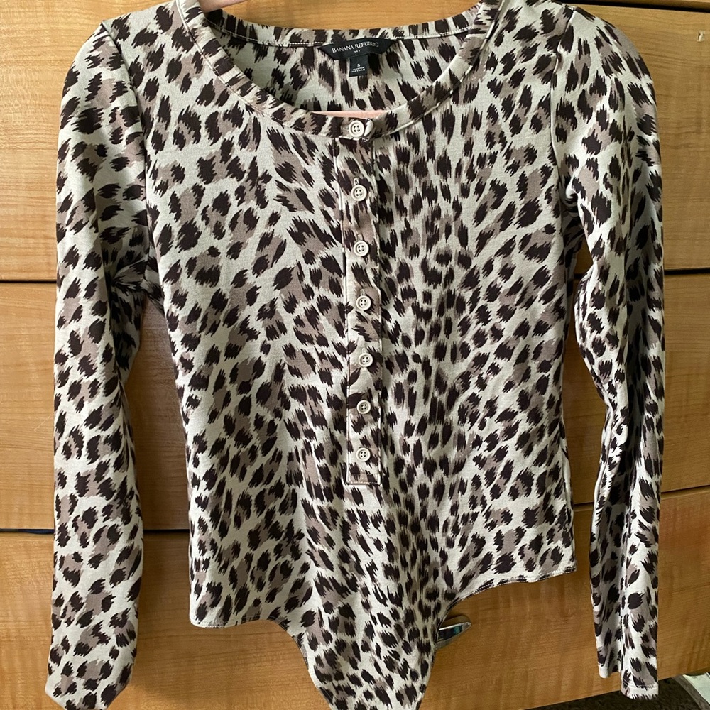 Brand new. Never worn but took the tag off.